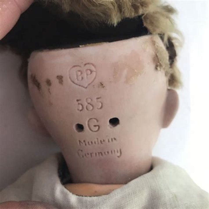 How do I identify my doll?