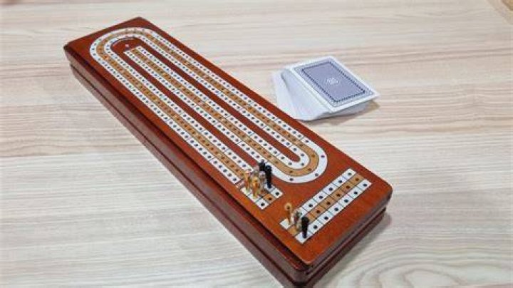 What are the extra holes on a cribbage board for?