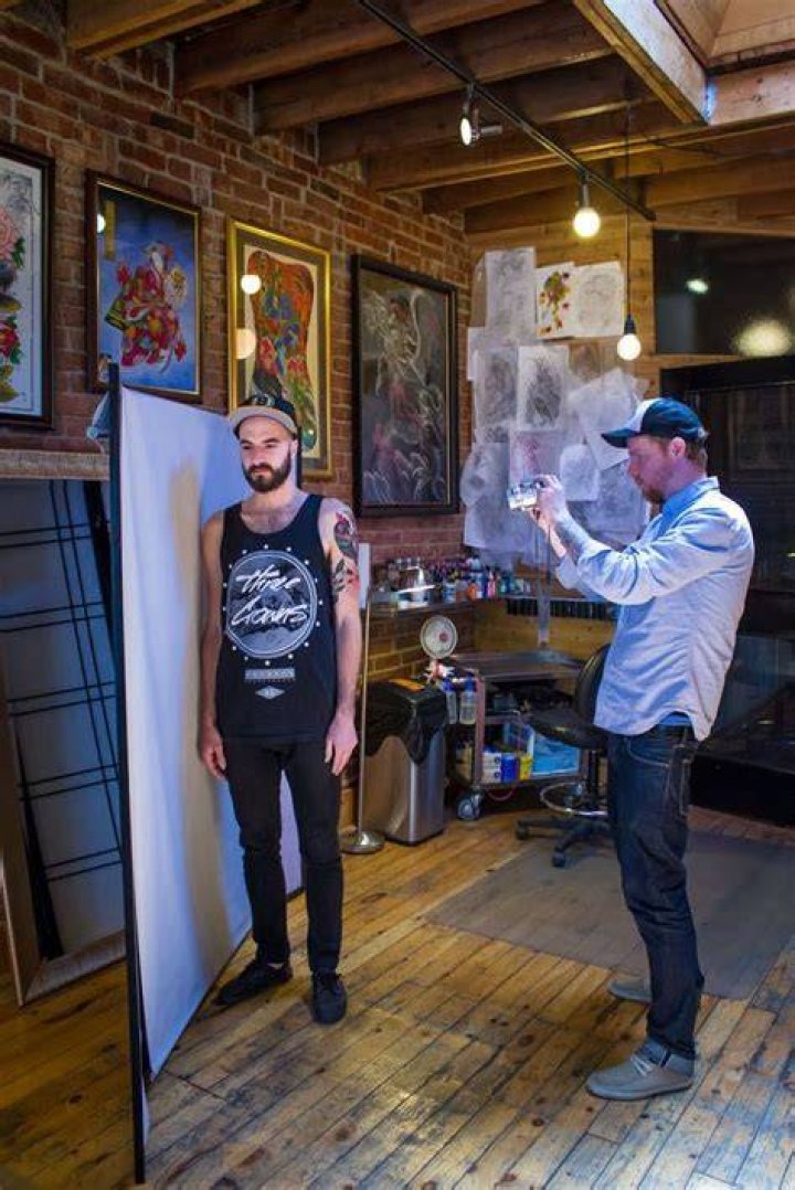 Where is Under my Thumb tattoo studio located?
